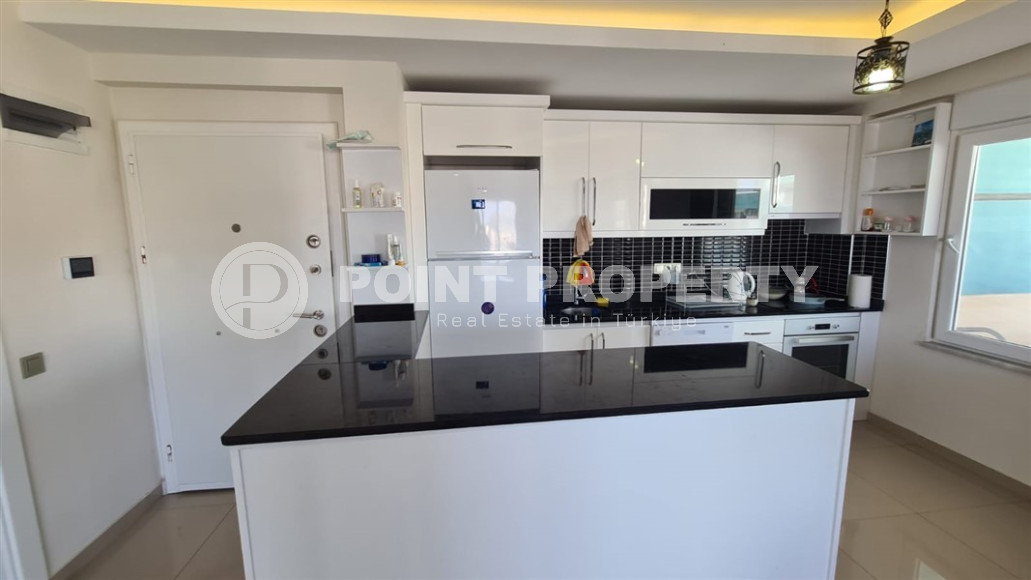 Cozy two-room apartment with a 1+1 layout and an area of 75 m2 in a complex with a swimming pool in the Mahmutlar area, 400 meters from the sea-id-1329-photo-8