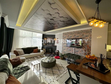 Апартаменты 2+1 с интересными дизайнерскими решениями в интерьере в центре района Оба.-id-3915-фото-2