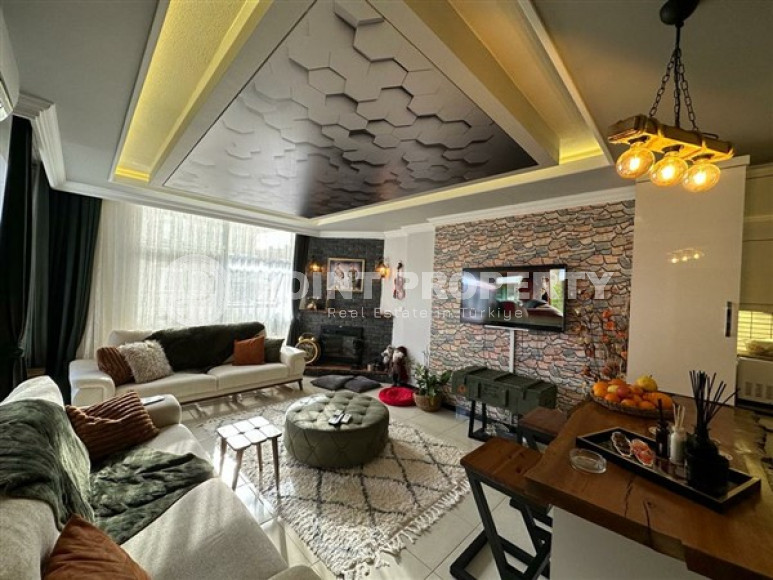 Апартаменты 2+1 с интересными дизайнерскими решениями в интерьере в центре района Оба.-id-3915-фото-2