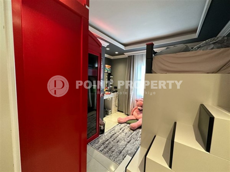 Апартаменты 2+1 с интересными дизайнерскими решениями в интерьере в центре района Оба.-id-3915-фото-4