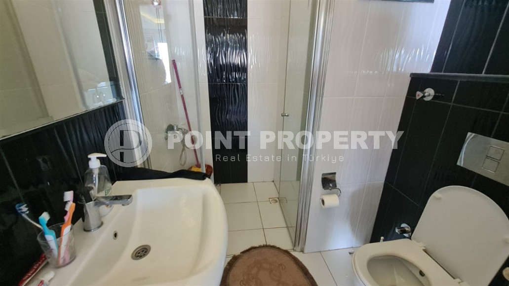 Cozy two-room apartment with a 1+1 layout and an area of 75 m2 in a complex with a swimming pool in the Mahmutlar area, 400 meters from the sea-id-1329-photo-15