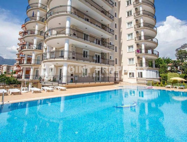 Furnished three-room apartment with an area of 115 m2, Tosmur district-id-3918-photo-1