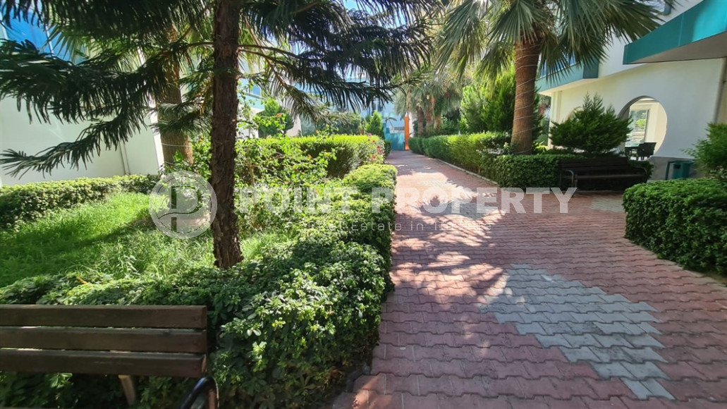 Cozy two-room apartment with a 1+1 layout and an area of 75 m2 in a complex with a swimming pool in the Mahmutlar area, 400 meters from the sea-id-1329-photo-20