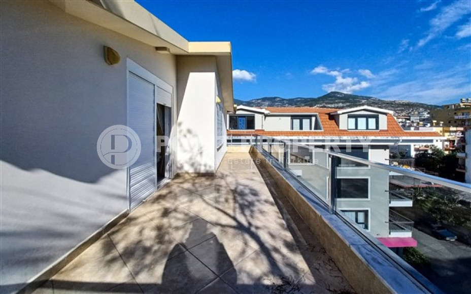 Просторный дуплекс 5+2 на 4-м этаже с мансардой в центральной части Аланьи.-id-3921-фото-18