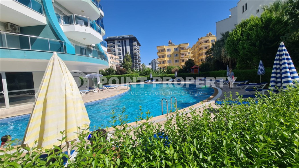 Cozy two-room apartment with a 1+1 layout and an area of 75 m2 in a complex with a swimming pool in the Mahmutlar area, 400 meters from the sea-id-1329-photo-25