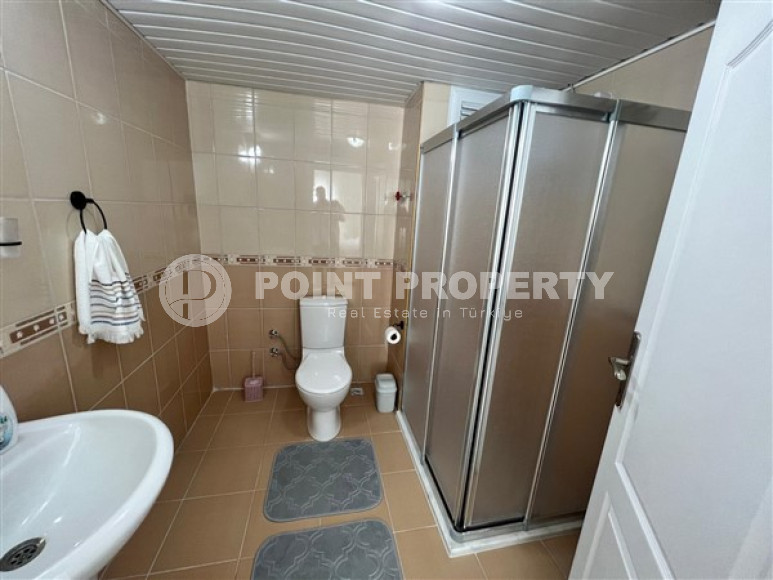 Стильная двухкомнатная квартира в центре благоустроенного престижного района Аланьи Тосмур.-id-3924-фото-6