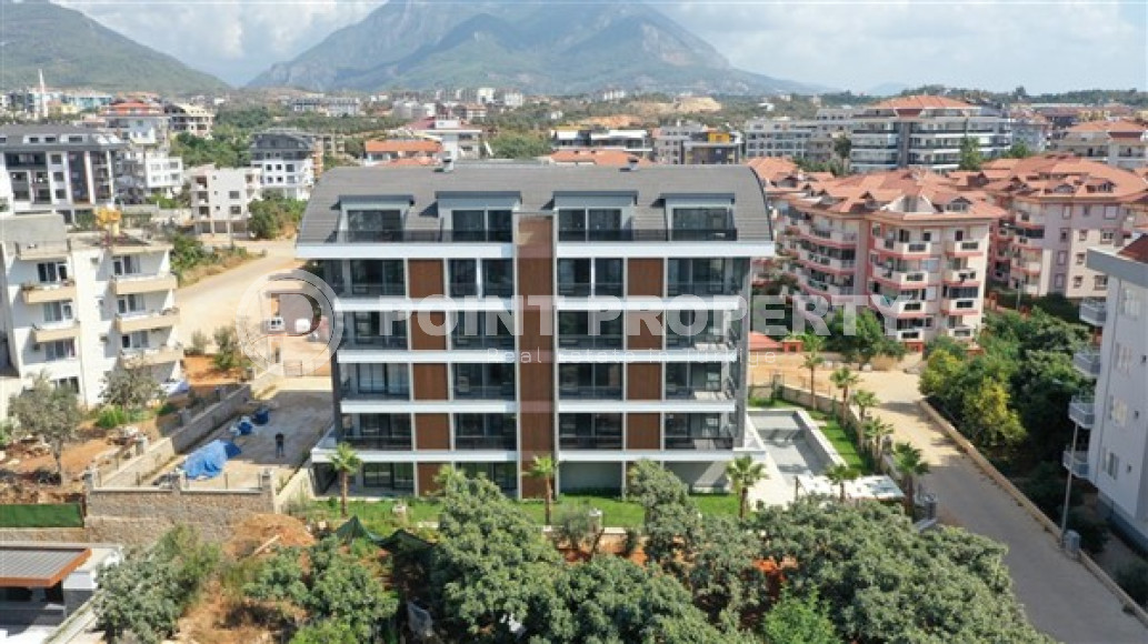 Комфортабельные апартаменты 1+1 с площадью 55 м2 в районе Оба-id-3926-фото-2