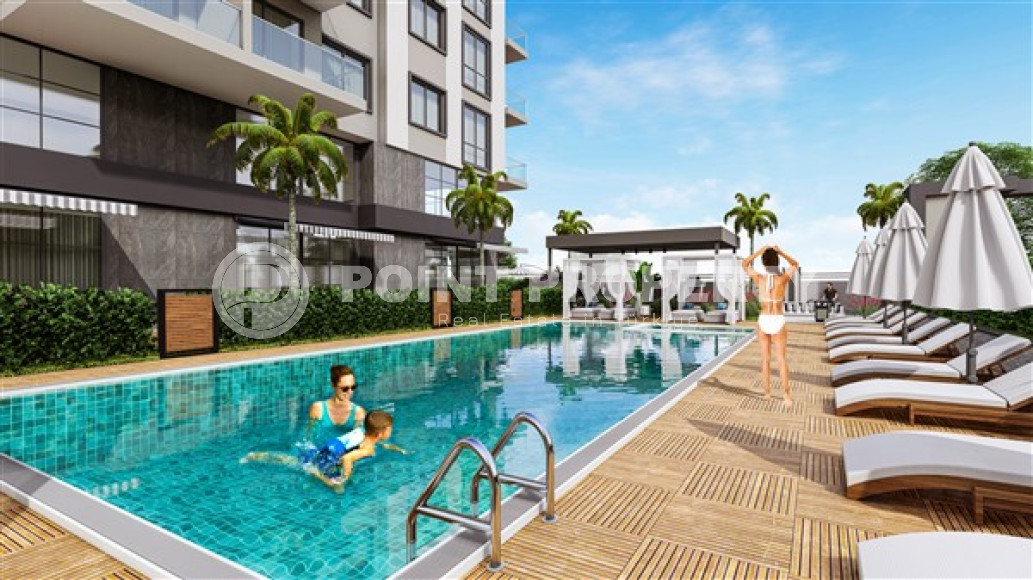 Inexpensive apartments 45 - 78 m2 in a high-rise investment project at the stage of completion, Mahmutlar-id-3931-photo-2