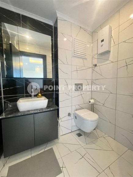 Двухуровневые апартаменты 2+1 с площадью 98 м2 в районе Оба. Продаются с мебелью.-id-3935-фото-10