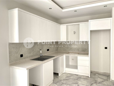 Small apartment 1+1, with a total area of 55 m2, in a house at the final stage of construction.-id-3940-photo-4