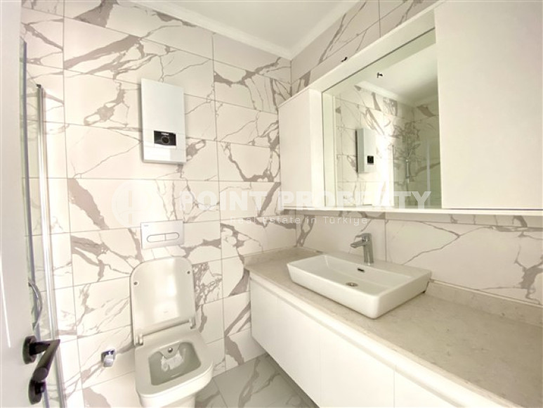 Небольшая квартира 1+1, общей площадью 55 м2, в доме на завершающем этапе строительства.-id-3940-фото-5