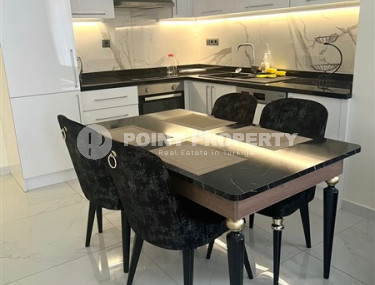 Прекрасная светлая квартира 1+1 с современным дизайном и хорошим ремонтом в 500 метрах от моря.-id-3942-фото-3