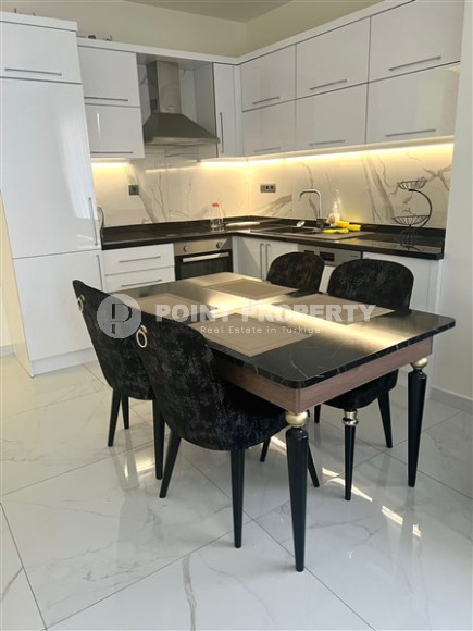 Прекрасная светлая квартира 1+1 с современным дизайном и хорошим ремонтом в 500 метрах от моря.-id-3942-фото-3