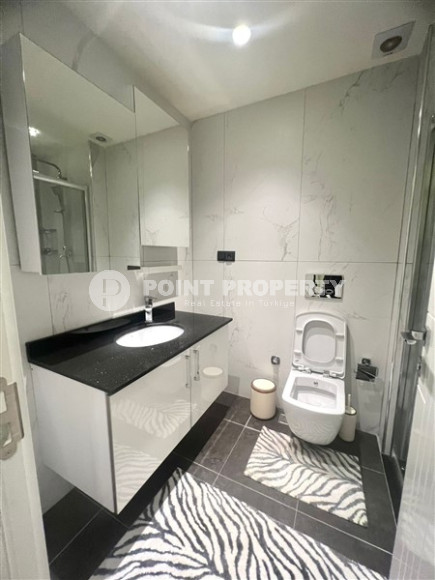 Прекрасная светлая квартира 1+1 с современным дизайном и хорошим ремонтом в 500 метрах от моря.-id-3942-фото-5