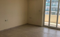 Two-room apartment 2+1, with a total area of 110 m2, on the 10th floor in the popular Mahmutlar area of Alanya.-id-3943-photo-2