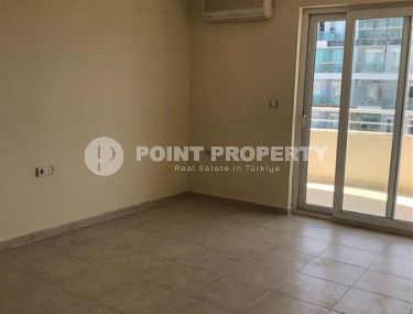 Two-room apartment 2+1, with a total area of 110 m2, on the 10th floor in the popular Mahmutlar area of Alanya.-id-3943-photo-2