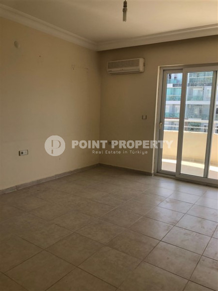 Two-room apartment 2+1, with a total area of 110 m2, on the 10th floor in the popular Mahmutlar area of Alanya.-id-3943-photo-2