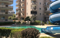 Two-room apartment 2+1, with a total area of 110 m2, on the 10th floor in the popular Mahmutlar area of Alanya.-id-3943-photo-9