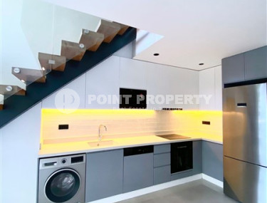 Стильный современный дуплекс с одной спальней, общей площадью 60 м2, в 150 метрах от знаменитого пляжа Клеопатры.-id-3944-фото-2