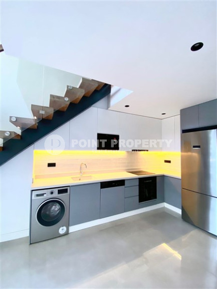 Стильный современный дуплекс с одной спальней, общей площадью 60 м2, в 150 метрах от знаменитого пляжа Клеопатры.-id-3944-фото-2