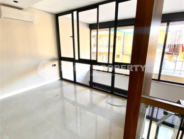 Стильный современный дуплекс с одной спальней, общей площадью 60 м2, в 150 метрах от знаменитого пляжа Клеопатры.-id-3944-фото-3