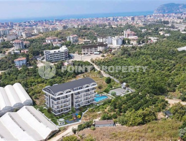 Новый проект -  апартаменты в роскошном жилом комплексе с максимально развитой инфраструктурой в престижном районе Аланьи Оба.-id-3946-фото-3