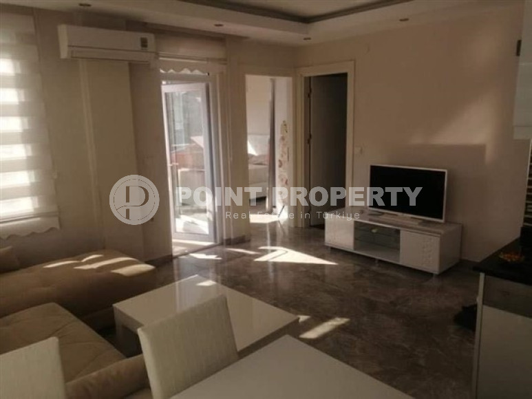 Небольшая квартира с хорошим ремонтом и светлым классическим интерьером в центре района Оба.-id-3947-фото-2