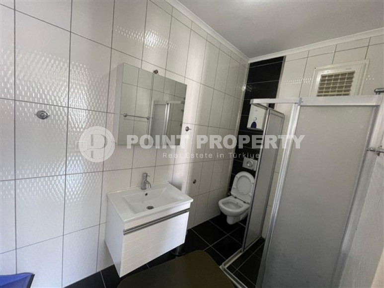 Небольшая квартира с хорошим ремонтом и светлым классическим интерьером в центре района Оба.-id-3947-фото-7