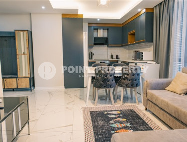 Стильная современная квартира 1+1 в новом доме в самом центре Аланьи.-id-3948-фото-2