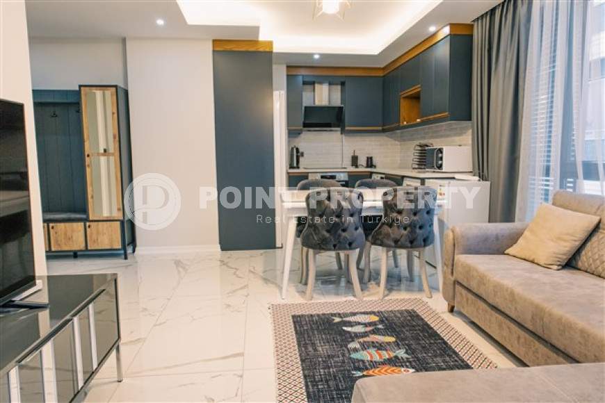 Стильная современная квартира 1+1 в новом доме в самом центре Аланьи.-id-3948-фото-2