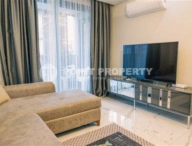 Стильная современная квартира 1+1 в новом доме в самом центре Аланьи.-id-3948-фото-3