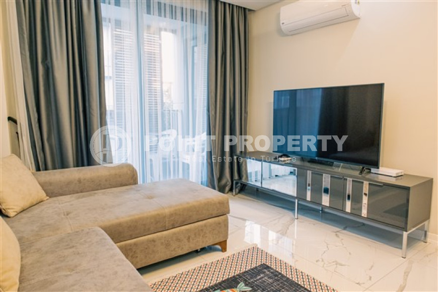 Стильная современная квартира 1+1 в новом доме в самом центре Аланьи.-id-3948-фото-3