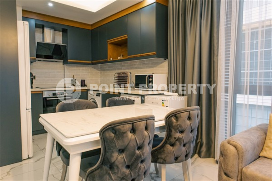 Стильная современная квартира 1+1 в новом доме в самом центре Аланьи.-id-3948-фото-4