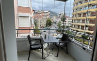 Charming three-room apartment of 80 m2 with furniture, near the center of Alanya-id-3954-photo-2