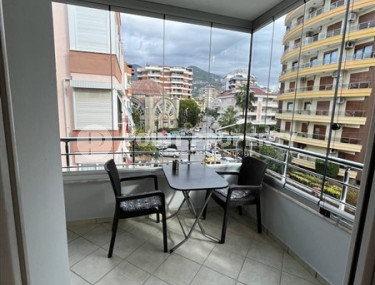 Charming three-room apartment of 80 m2 with furniture, near the center of Alanya-id-3954-photo-2
