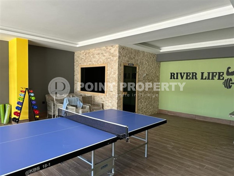 Двухкомнатные апартаменты с планировкой 1+1 в резиденции 2022 года на некотором удалении от моря, район Оба-id-3955-фото-3