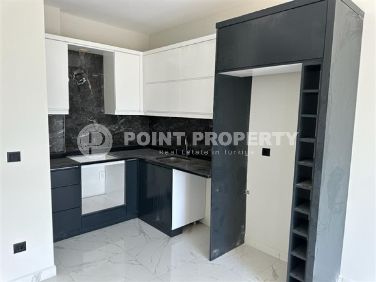 Двухкомнатные апартаменты с планировкой 1+1 в резиденции 2022 года на некотором удалении от моря, район Оба-id-3955-фото-5