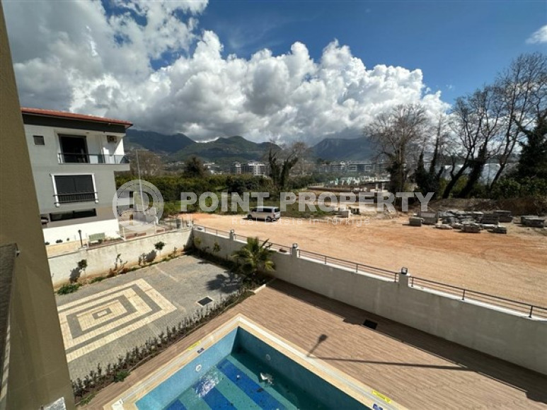 Двухкомнатные апартаменты с планировкой 1+1 в резиденции 2022 года на некотором удалении от моря, район Оба-id-3955-фото-9