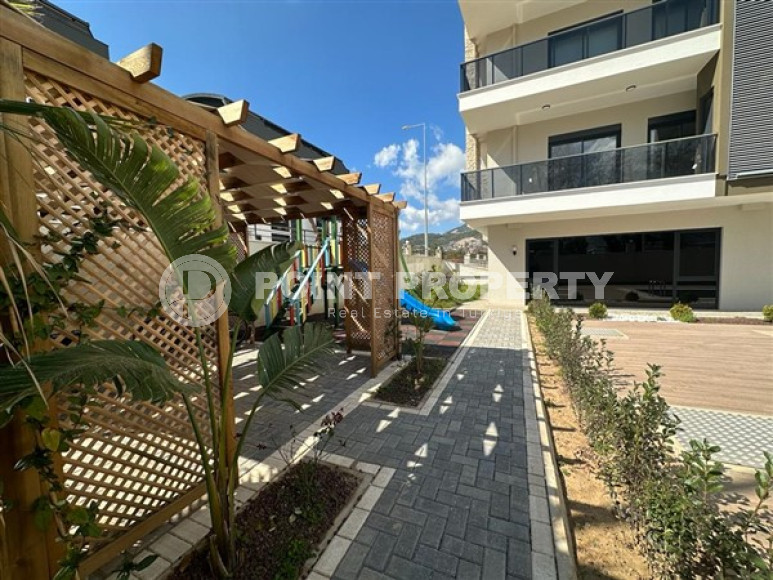 Двухкомнатные апартаменты с планировкой 1+1 в резиденции 2022 года на некотором удалении от моря, район Оба-id-3955-фото-12