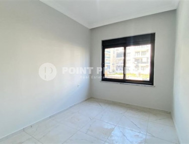 Apartment 1+1 in fine finishing in the center of Mahmutlar.-id-3962-photo-1