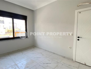 Apartment 1+1 in fine finishing in the center of Mahmutlar.-id-3962-photo-2