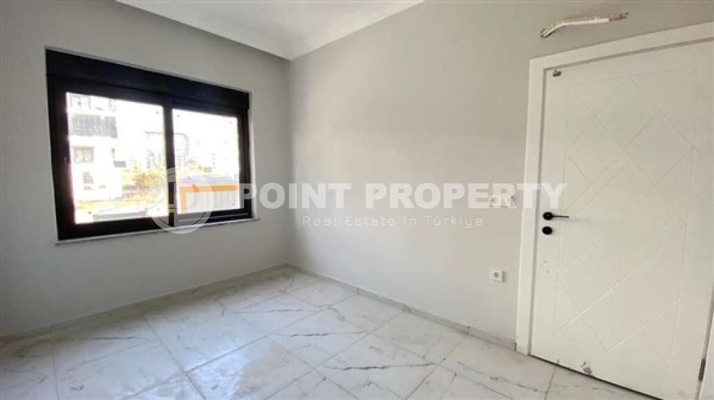 Апартаменты 1+1 в чистовой отделке в центре района Махмутлар.-id-3962-фото-2