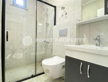 Apartment 1+1 in fine finishing in the center of Mahmutlar.-id-3962-photo-3