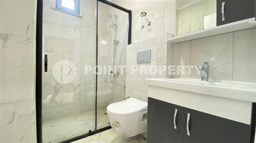 Апартаменты 1+1 в чистовой отделке в центре района Махмутлар.-id-3962-фото-3