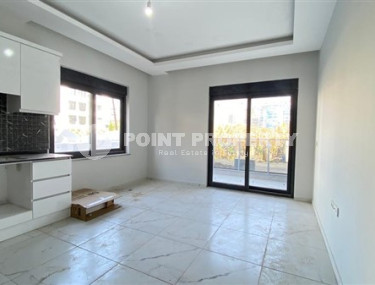 Apartment 1+1 in fine finishing in the center of Mahmutlar.-id-3962-photo-4