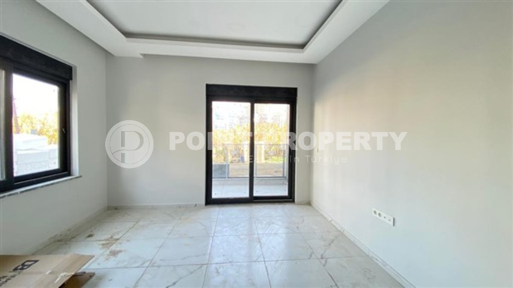 Апартаменты 1+1 в чистовой отделке в центре района Махмутлар.-id-3962-фото-5