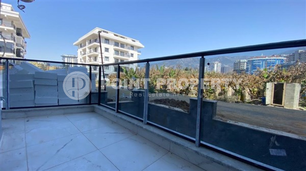 Апартаменты 1+1 в чистовой отделке в центре района Махмутлар.-id-3962-фото-6