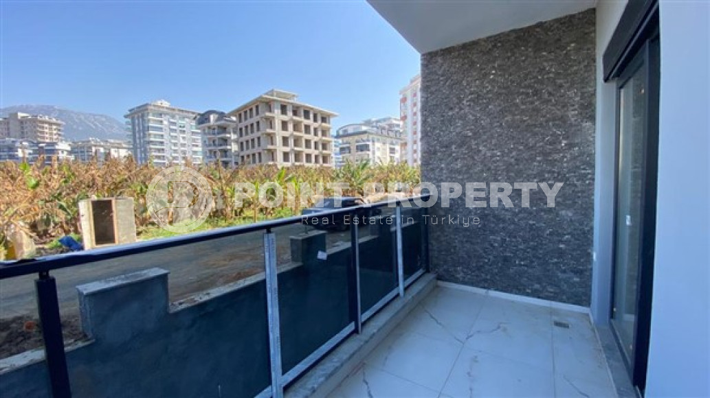 Апартаменты 1+1 в чистовой отделке в центре района Махмутлар.-id-3962-фото-7