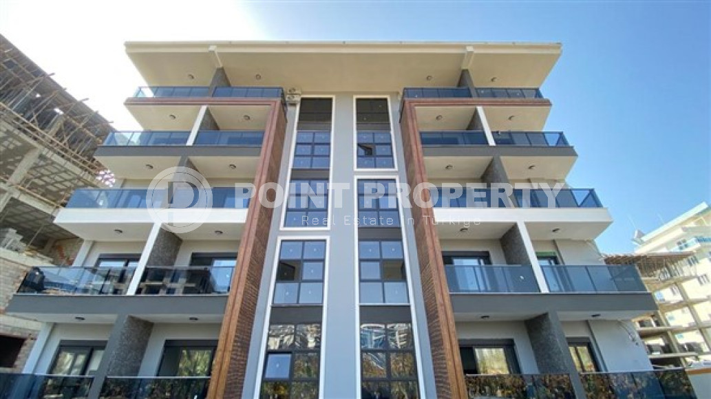 Апартаменты 1+1 в чистовой отделке в центре района Махмутлар.-id-3962-фото-9