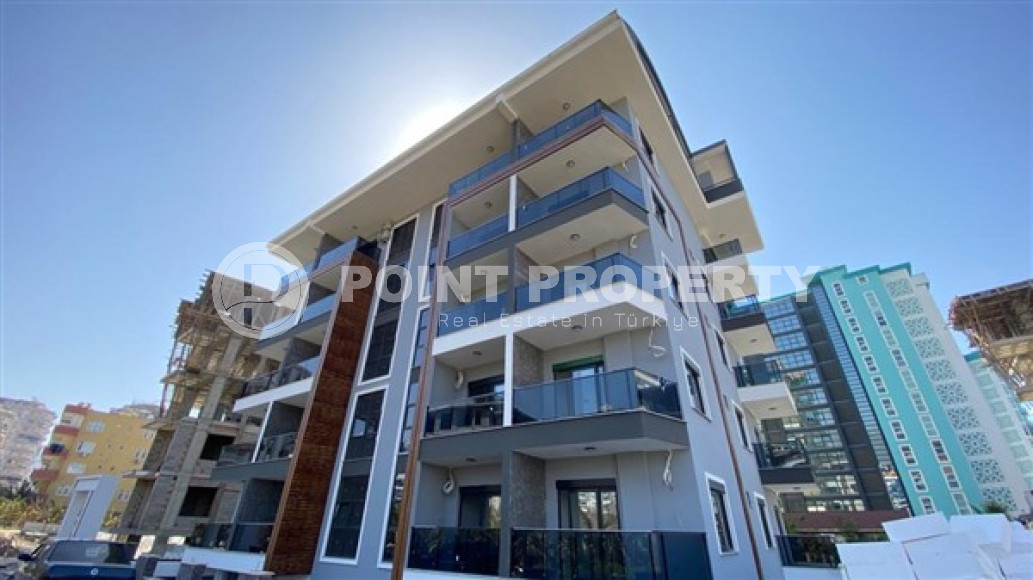 Апартаменты 1+1 в чистовой отделке в центре района Махмутлар.-id-3962-фото-10